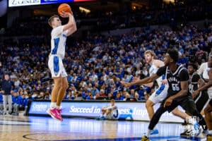 Creighton Bluejays guard Steven Ashworth (1) makes a three-point shot against Providence Friars forward Oswin Erhunmwunse (55) in the first half during a college basketball game, Tuesday, January 14, 2025, in Omaha, Nebraska. Photo by John S. Peterson.