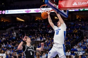 Creighton Bluejays center Ryan Kalkbrenner (11) makes dunk against the Providence Friars in the first half during a college basketball game, Tuesday, January 14, 2025, in Omaha, Nebraska. Photo by John S. Peterson.