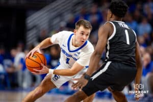 Creighton Bluejays guard Steven Ashworth (1) dribbles the ball against Providence Friars guard Jayden Pierre (1) in the first half during a college basketball game, Tuesday, January 14, 2025, in Omaha, Nebraska. Photo by John S. Peterson.