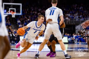 Creighton Bluejays guard Steven Ashworth (1) dribbles around a screen against the Providence Friars in the first half during a college basketball game, Tuesday, January 14, 2025, in Omaha, Nebraska. Photo by John S. Peterson.