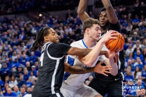 Creighton Bluejays center Ryan Kalkbrenner (11) drives to the basket against Providence Friars guard Corey Floyd Jr. (14) in the first half during a college basketball game, Tuesday, January 14, 2025, in Omaha, Nebraska. Photo by John S. Peterson.