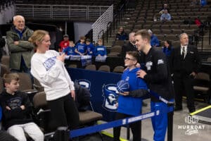 Creighton Bluejays guard Steven Ashworth (1) poses for a photo with a young fan before the game against the Providence Friars during a college basketball game, Tuesday, January 14, 2025, in Omaha, Nebraska. Photo by John S. Peterson.