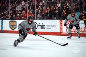 UNO Mavericks player, Brady Risk, rushes toward the goal during a college hockey game on Jan 11th, 2025 in Omaha, Nebraska. Photo by Logan Hock