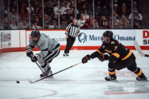 UNO Mavericks player, Tyler Rollwagen, rushes toward the puck during a college hockey game on Jan 11th, 2025 in Omaha, Nebraska. Photo by Logan Hock