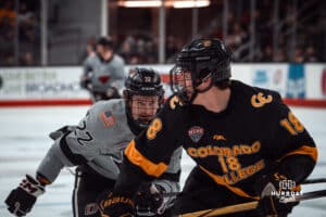 UNO Mavericks player, Jimmy Glynn, stares down opponent during a college hockey game on Jan 11th, 2025 in Omaha, Nebraska. Photo by Logan Hock