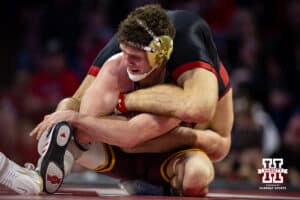 #5 Nebraska Cornhusker Ridge Lovett has #21 Minnesota Golden Gopher Drew Roberts all tied up during a college wrestling match, Saturday, January 11, 2025, in Lincoln, Nebraska. Lovett defeats Roberts 5-0. Photo by John S. Peterson.