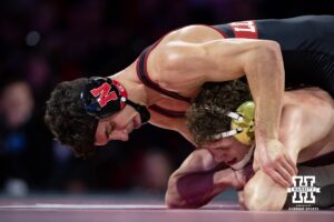 #5 Nebraska Cornhusker Ridge Lovett works the arms against #21 Minnesota Golden Gopher Drew Roberts during a college wrestling match, Saturday, January 11, 2025, in Lincoln, Nebraska. Lovett defeats Roberts 5-0. Photo by John S. Peterson.