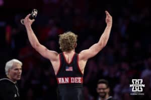 #19 Nebraska Cornhusker Jacob Van Dee celebrates the win against #11 Minnesota Golden Gophers Tyler Wells during a college wrestling match, Saturday, January 11, 2025, in Lincoln, Nebraska. Van Dee upsets Wells 4-1. Photo by John S. Peterson.