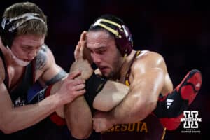 #22 Nebraska Cornhusker Camden McDanel defends against #9 Minnesota Golden Gopher Isaiah Salazar during a college wrestling match, Saturday, January 11, 2025, in Lincoln, Nebraska. Salazar defeats McDanel 8-0. Photo by John S. Peterson.