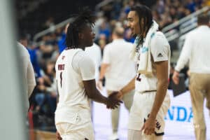 Omaha Maverick JJ White and Kamryn Thomas shaking hands after the game during a basketball game at Baxter Arena on January 11th, 2025 in Omaha Nebraska. Photo by Collin Stilen.