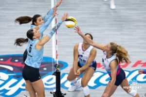 Omaha Supernovas outside hitter Brooke Nuneviller (5) tips the ball against Atlanta Vibe opposite hitter Merritt Beason (5) during a professional volleyball match, Friday, January 10, 2025, in Omaha, Nebraska. Photo by John S. Peterson.