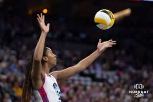 Omaha Supernovas middle blocker Kaitlyn Hord (23) throws the ball in the air to serve against the Atlanta Vibe during a professional volleyball match, Friday, January 10, 2025, in Omaha, Nebraska. Photo by John S. Peterson.
