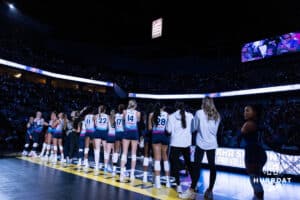 Omaha Supernovas watch the banner drop to celebrate the 2024 Championship before the match against the Atlanta Vibe during a professional volleyball match, Friday, January 10, 2025, in Omaha, Nebraska. Photo by John S. Peterson.