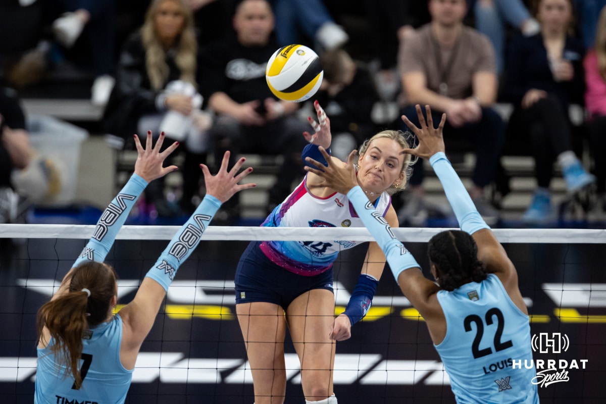 Supernovas outside hitter Ally Batenhorst (14) spikes the ball against the Atlanta Vibe during a professional volleyball match, Fridday, January 10, 2025, in Omaha, Nebraska. Photo by John S. Peterson.