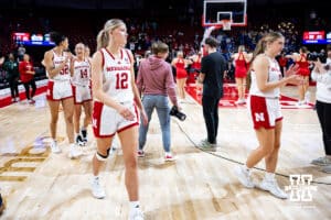 Nebraska Cornhuskers walking to center corut to huddle up after the win over the Michigan State Spartans during a college basketball game, Wednesday, January 8, 2025, in Lincoln, Nebraska. Photo by John S. Peterson.