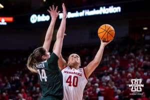 Nebraska Cornhuskers center Alexis Markowski (40) makes a layup against Michigan State Spartans forward Grace VanSlooten (14) in the fourth quarter during a college basketball game, Wednesday, January 8, 2025, in Lincoln, Nebraska. Photo by John S. Peterson.