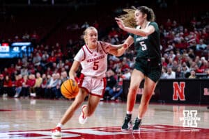 Nebraska Cornhuskers guard Alberte Rimdal (5) drives the lane against Michigan State Spartans guard Emma Shumate (5) in the second half during a college basketball game, Wednesday, January 8, 2025, in Lincoln, Nebraska. Photo by John S. Peterson.