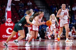 Nebraska Cornhuskers guard Logan Nissley (2) dribbles the ball down the court against Michigan State Spartans guard Theryn Hallock (4) in the second half during a college basketball game, Wednesday, January 8, 2025, in Lincoln, Nebraska. Photo by John S. Peterson.