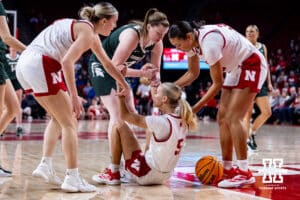 Nebraska Cornhuskers guard Alberte Rimdal (5) gets some help getting up against the Michigan State Spartans in the first half during a college basketball game, Wednesday, January 8, 2025, in Lincoln, Nebraska. Photo by John S. Peterson.