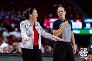 Nebraska Cornhuskers head coach Amy Williams talks to a referee against the Michigan State Spartans during a college basketball game, Wednesday, January 8, 2025, in Lincoln, Nebraska. Photo by John S. Peterson.