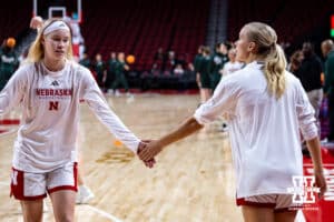 Nebraska Cornhuskers guard Britt Prince (23) and guard Alberte Rimdal (5) give each other five warming up to take on Michigan State Spartans during a college basketball game, Wednesday, January 8, 2025, in Lincoln, Nebraska. Photo by John S. Peterson.