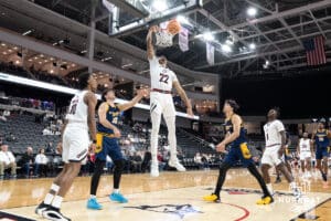Omaha Mavericks Kamryn Thomas finds a lane and dunks during a college basketball game against Kansas City on January 8th, 2025 in Omaha Nebraska. Photo by Brandon Tiedemann.