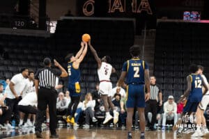 Omaha Mavericks Ja'Sean Glover blocks a shot during a college basketball game against Kansas City on January 8th, 2025 in Omaha Nebraska. Photo by Brandon Tiedemann.