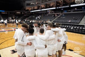 Omaha Maverick huddling before a college basketball game against Kansas City on January 8th, 2025 in Omaha Nebraska. Photo by Brandon Tiedemann.