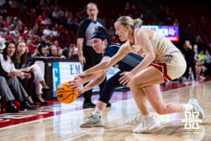 Nebraska Cornhuskers guard Allison Weidner (3) goes after the ball against Penn State Nittany Lions guard Gabby Elliott (0) in the first quarter during women’s college basketball game, Sunday, January 5, 2025, in Lincoln, Nebraska. Photo by John S. Peterson.