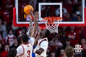 Nebraska Cornhuskers forward Juwan Gary (4) blocks a shot against UCLA Bruins guard Dylan Andrews (2) at the end of the second half during college basketball game, Saturday, January 4, 2024, in Lincoln, Nebraska. Photo by John S. Peterson.