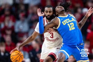 Nebraska Cornhuskers guard Brice Williams (3) dribblea the ball down the court as UCLA Bruins guard Sebastian Mack (12) move in the way in second half during college basketball game, Saturday, January 4, 2024, in Lincoln, Nebraska. Photo by John S. Peterson.