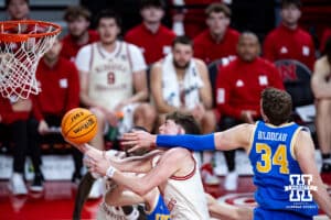 Nebraska Cornhuskers guard Connor Essegian (0) drives to the basket for a layup against UCLA Bruins forward Tyler Bilodeau (34) in the second half during college basketball game, Saturday, January 4, 2024, in Lincoln, Nebraska. Photo by John S. Peterson.