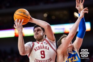 Nebraska Cornhuskers forward Berke Buyuktuncel (9) grabs the rebound against the UCLA Bruins in the second half during college basketball game, Saturday, January 4, 2024, in Lincoln, Nebraska. Photo by John S. Peterson.