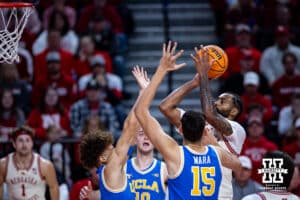 Nebraska Cornhuskers guard Brice Williams (3) drives to the basket for a layup against the UCLA Bruins in the first half during college basketball game, Saturday, January 4, 2024, in Lincoln, Nebraska. Photo by John S. Peterson.