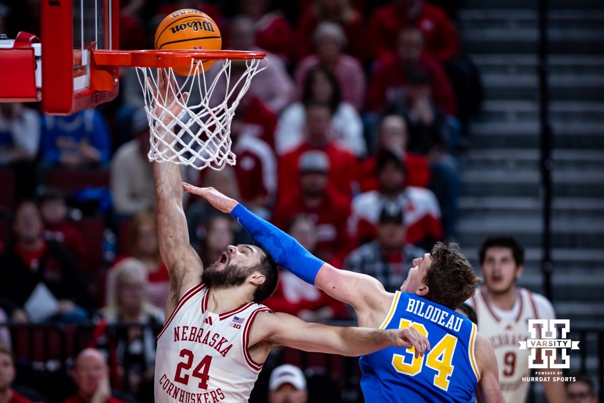 Nebraska Cornhuskers guard Rollie Worster (24) drives to the basket for a layup against UCLA Bruins forward Tyler Bilodeau (34) in the first half during college basketball game, Saturday, January 4, 2024, in Lincoln, Nebraska. Photo by John S. Peterson.