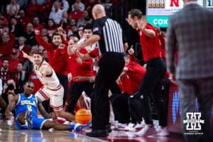 Nebraska Cornhuskers react to Sam Hoiberg getting UCLA Bruins guard Dylan Andrews (2) knocking the ball out-of-bounds in the first half during college basketball game, Saturday, January 4, 2024, in Lincoln, Nebraska. Photo by John S. Peterson.