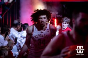 Nebraska Cornhuskers center Braxton Meah (34) runs out of the tunnel to take on UCLA Bruins during college basketball game, Saturday, January 4, 2024, in Lincoln, Nebraska. Photo by John S. Peterson.