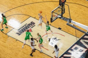 Omaha Mavericks Grace Cave shoots a floater during a college basketball game against North Dakota on January 2nd, 2025 in Omaha Nebraska. Photo by Brandon Tiedemann.
