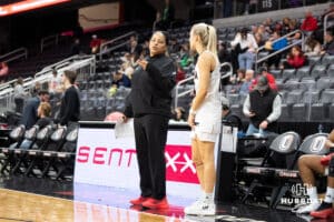 Omaha Mavericks head coach Carrie Banks talks with Grace Cave during a college basketball game against North Dakota on January 2nd, 2025 in Omaha Nebraska. Photo by Brandon Tiedemann.