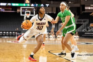 Omaha Mavericks Ja Harvey looks to shoot during a college basketball game against North Dakota on January 2nd, 2025 in Omaha Nebraska. Photo by Brandon Tiedemann.