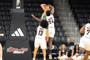 Omaha Mavericks Morgann Gardner blocks a shot during a college basketball game against North Dakota on January 2nd, 2025 in Omaha Nebraska. Photo by Brandon Tiedemann.