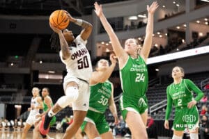 Omaha Mavericks Ja Harvey attempts a layup during a college basketball game against North Dakota on January 2nd, 2025 in Omaha Nebraska. Photo by Brandon Tiedemann.