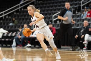 Omaha Mavericks Katie Keitges looks to pass the ball during a college basketball game against North Dakota on January 2nd, 2025 in Omaha Nebraska. Photo by Brandon Tiedemann.