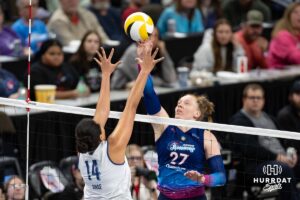 Omaha Supernovas Emily Londot (27) taps the ball against Orlando Valkyrie Adora Anae (14) during professional volleyball event Thursday, February 27, 2025 in Lincoln, Nebraska. Photo by John S. Peterson.