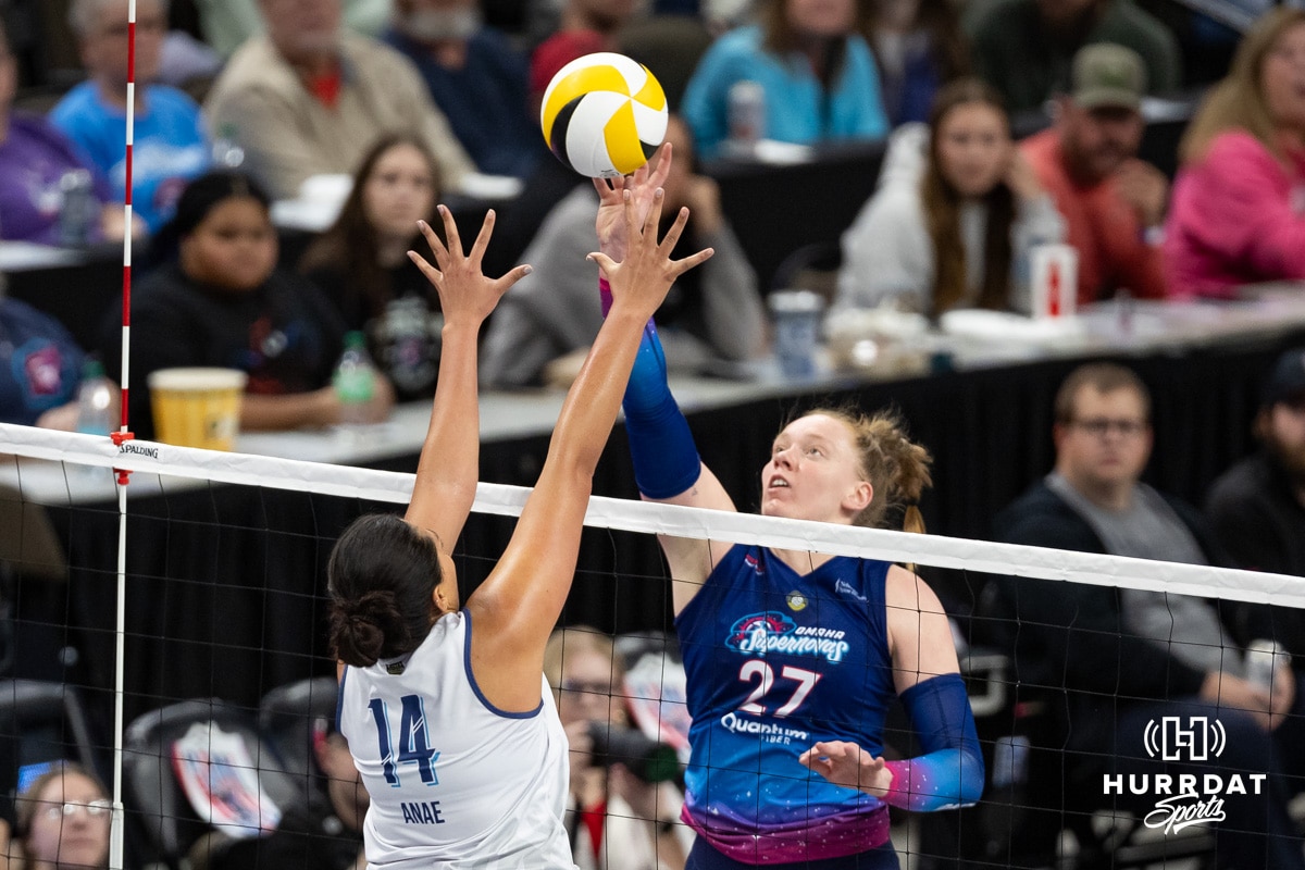 Omaha Supernovas Emily Londot (27) taps the ball against Orlando Valkyrie Adora Anae (14) during professional volleyball event Thursday, February 27, 2025 in Lincoln, Nebraska. Photo by John S. Peterson.