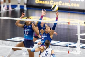 Omaha Supernovas Reagan Cooper (8) reaches for the ball against Orlando Valkyrie Brittany Abercrombie (6) during professional volleyball event Thursday, February 27, 2025 in Lincoln, Nebraska. Photo by John S. Peterson.