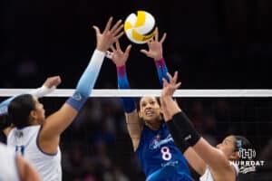 Omaha Supernovas Reagan Cooper (8) jumps to block against the Orlando Valkyries during professional volleyball event Thursday, February 27, 2025 in Lincoln, Nebraska. Photo by John S. Peterson.