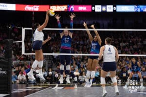 Omaha Supernovas Emily Londot (27) and Kayla Caffey (28) jumps to block Orlando Valkyrie Adora Anae (14) during professional volleyball event Thursday, February 27, 2025 in Lincoln, Nebraska. Photo by John S. Peterson.