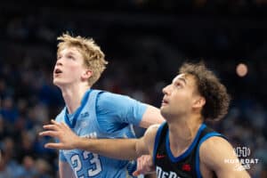 Creighton Bluejays Jackson McAndrew looks to grab a rebound during a college basketball game against Depaul on February 26th, 2025 in Omaha Nebraska. Photo by Brandon Tiedemann.
