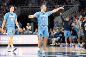 Creighton Bluejays Steven Ashworth hypes up a teammate during a college basketball game against Depaul on February 26th, 2025 in Omaha Nebraska. Photo by Brandon Tiedemann.